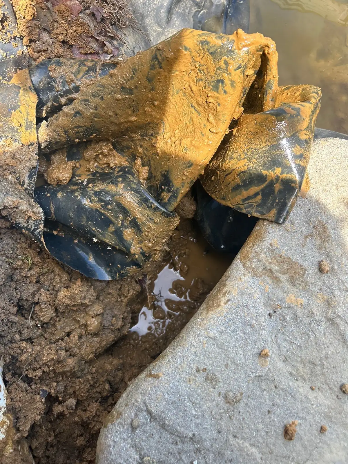 Completed leak repair on pond liner with verified seal in Delaware