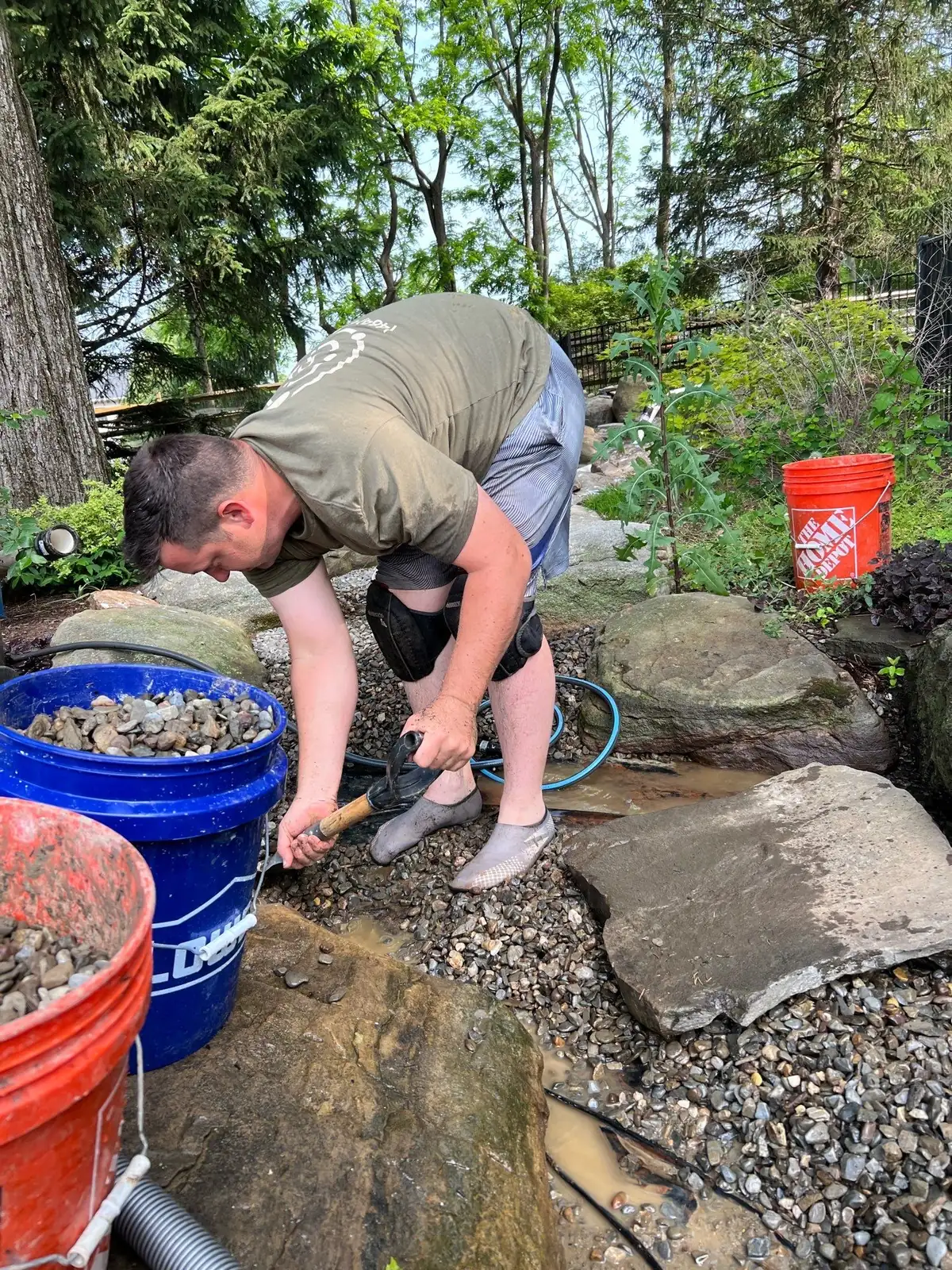 Pond being drained during professional cleanout service