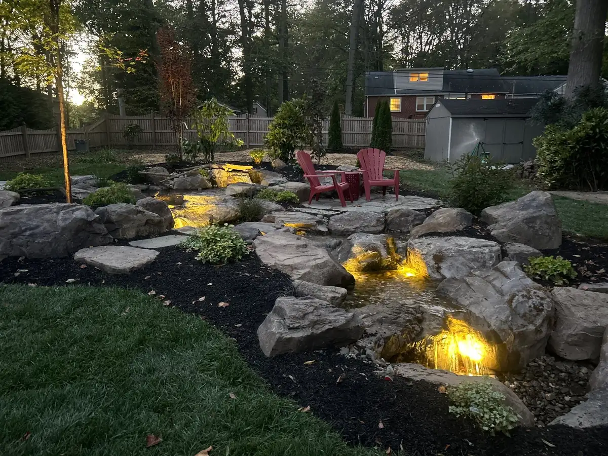 Pondless waterfall with disappearing water into hidden basin in Delaware